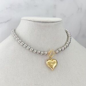 Elegant Silver and Gold Heart Pendant Necklace